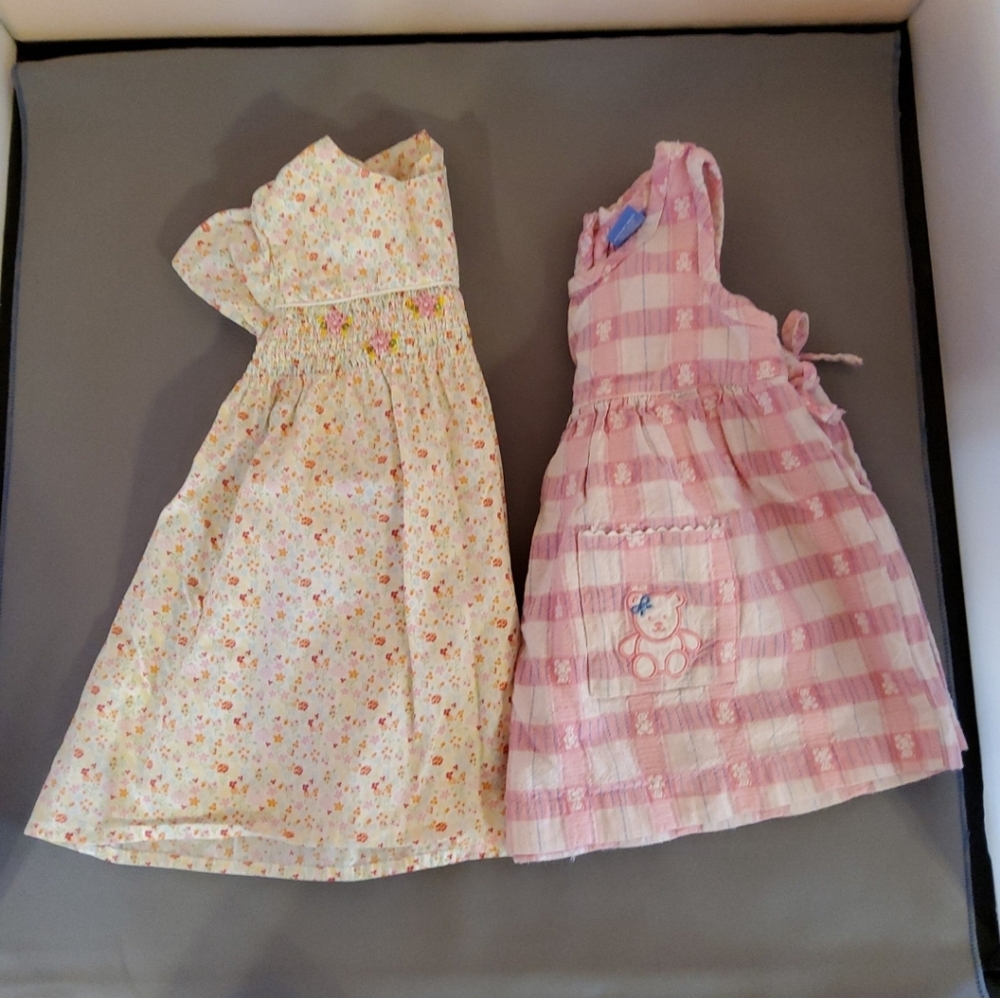 Two baby girl dresses